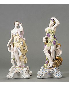 2006-Pareja de figuras de cerámica pintadas a mano, España, mediados s. XX. Representando a Baco y Flora. Sobre bases con rocallas. Marcas. Altura: 33 cm.