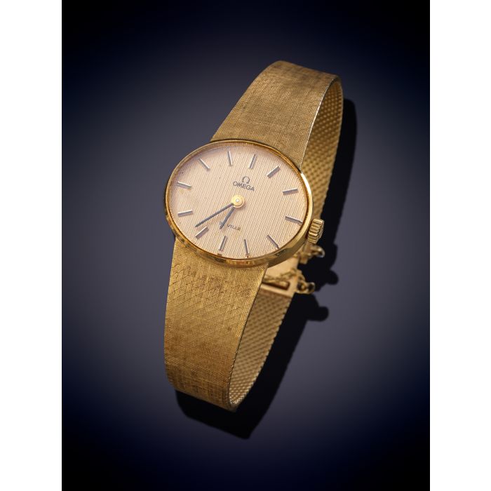 104-OMEGA" RELOJ DE PARA SEÑORA. CAJA Y BRAZALETE EN ORO AMARILLO DE 18K. MOVIMIENTO MECÁNICO MANUAL. Esfera dorada con numeración a trazos | Fernando Durán