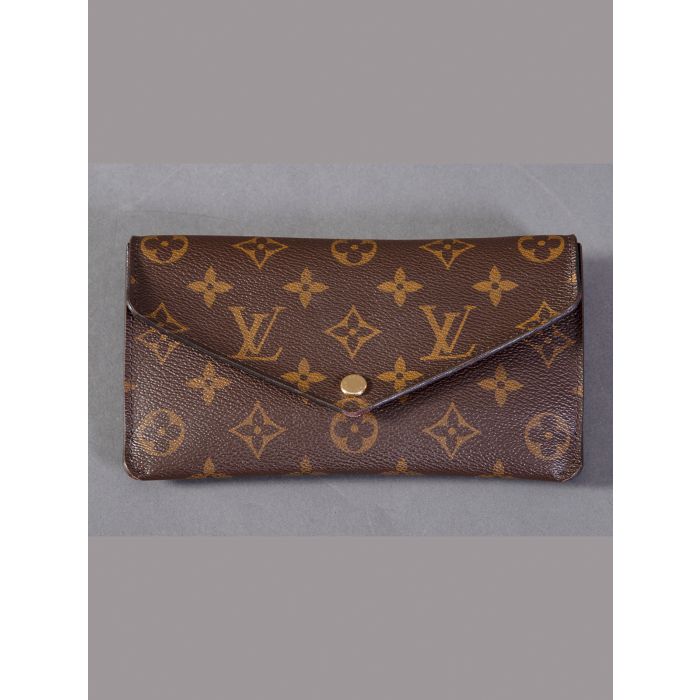 1155-LOUIS VUITTON CARTERA EN PIEL CON INICIALES DE LA FIRMA.