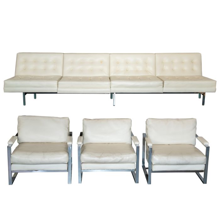 1379Juego de sofá y tres butacas italianos en piel blanca y acero