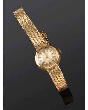 208-RELOJ DE PULSERA DUWARD. CAJA Y BRAZALETE EN ORO AMARILLO DE 18K. 