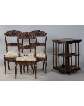 430-Juego de tres sillas españolas en madera de caoba siglo XIX. con decoracion de veneras y elementos vegetales. Tapicería en tela blanca con flores.