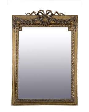 609-Gran espejo con marco estilo Luis XVI en madera tallada y dorada. S. XIX. 