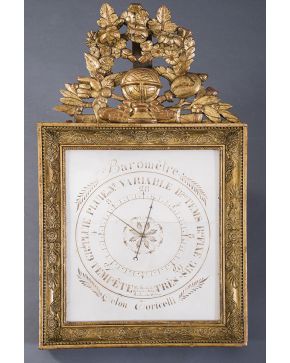 1076-Barómetro francés con inscripción  PAR ROCHELLE OPTICIEN AUX BATIGNOLE MONCEAUX PURE D´ORLEANS. S. XIX. Con marco en madera tallada y dorada con gra