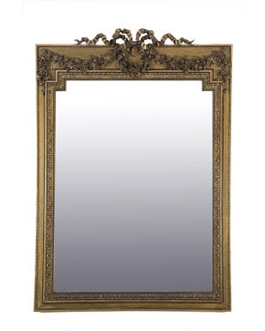 1137-Gran espejo con marco estilo Luis XVI en madera tallada y dorada. S. XIX. 