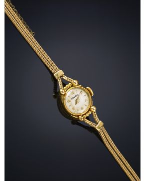 470-DUWARD Reloj de pulsera para señora. Caja y pulsera en cordón de oro. Pieza punzonada. Movimiento manual.
