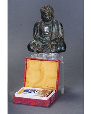 431-Pequeña figura de Buda en bronce. pp. s. XX.