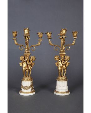 847-Pareja de candelabros estilo Luis XVI de tres luces en mármol blanco y bronce dorado. Francia c. 1860.