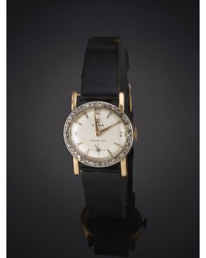 1091-CIMA Reloj antiguo de pulsera para señora caja en oro con decoración con chispitas de diamantes. Pulsera de piel. Movimiento mecánico manual.