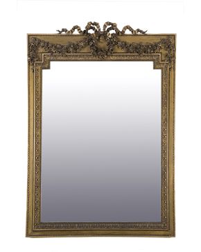 809-Gran espejo con marco estilo Luis XVI en madera tallada y dorada. S. XIX. 