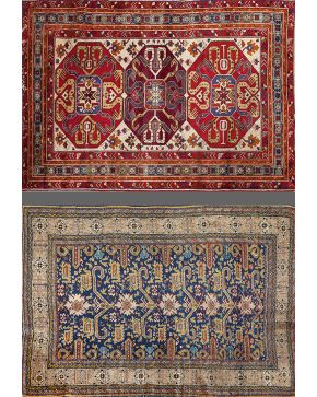 1202-Lote de dos alfombras persas en lana con decoración esquemática y vegetal sobre campos granate y azul oscura. 