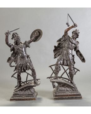 973-Pareja de guerreros en metal pavonado. ff. s. XIX.