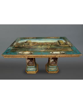 1084-Importante mesa de centro con placas de porcelana esmaltada de Sévres y aplicaciones de bronce dorado. Tapa con capricho de arquitecturas italianas y 