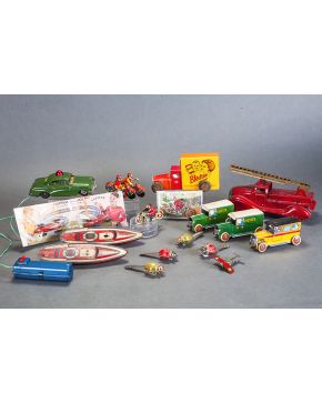 1397-Lote de juguetes de hojalata. de diversas procedencias y datados entre 1950-1970: cuatro sonajeros (dos escarabajos y dos mariquitas). sidecar de orig