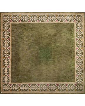 943-Lote de dos alfombras españolas en lana sobre campo verde. Decoración perimetral de espiga con flores sobre fondo beige. Rotura en una lateral de la d