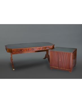512-Lote formado por: mesa de despacho y armario aparador bajo en madera tallada.