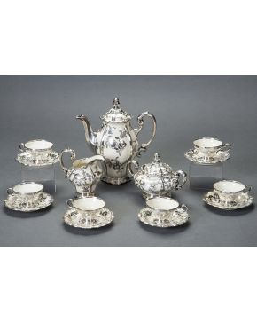 632-Elegante juego de café para seis servicios en porcelana de Rosenthal. cáscara de huevo. con aplicaciones de plata de ley 925. formando motivos florale