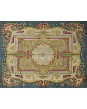 501-Importante alfombra en lana de nudo español de la Real Fábrica de Tapices. con marcas Stuyk. 1945. Rico colorido en tonos azules. rosas. verdes y amar