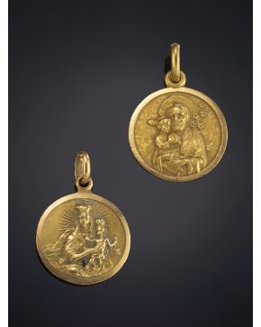 20-LOTE FORMADO POR DOS MEDALLAS EN ORO AMARILLO DE 18K. 