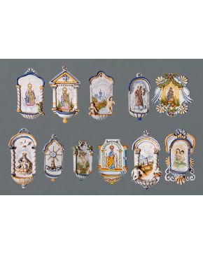 839-Colección de 12 pilas benditeras en cerámica española. Con diferentes imágenes religiosas.