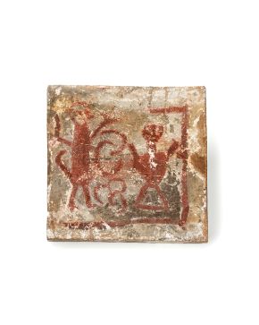 61-Socarrat de cerámica policromada representando un diablillo y una persona. Cataluña siglo XIV.