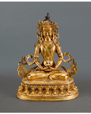 395-Buda tibetano en bronce dorado. mediados s. XX.