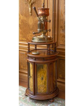 919-Original cafetera italiana en bronce dorado y cobre sobre mueble circular con parte inferior con doble puerta.