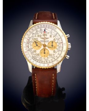 801-BREITLING" NAVITIMER COSMONAUTE. CAJA EN ACERO Y ORO AMARILLO, Nº D12022. MOVIMIENTO MECÁNICO MANUAL. Esfera gris con numeración a trazos aplicado