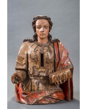 544-ESCUELA CASTELLANA S.XVII  Gran relicario de bulto redondo en madera tallada y policromada con libro en la mano. Medida: 73 x 53 cm  