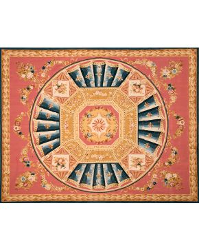 957-Importante alfombra Aubusson tejida en telar de alto lizo sobre cartón Carlos IV. Firmada M. Stuyck. En tonos rosas, azules y cremas. Cuajada de g