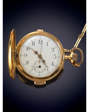 837-Reloj saboneta inglés pp. s. XX de complicación con sonería a cuartos y cronógrafo, remontoire. Caja lisa en oro ama