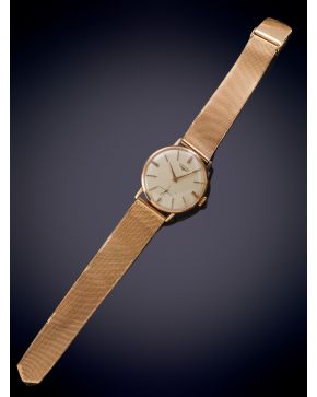 1091-LONGINES" RELOJ DE PULSERA PARA CABALLERO. AÑOS 40. CAJA Y BRAZALETE EN ORO AMARILLO DE 18K. MOVIMIENTO MECÁNICO MANUAL.