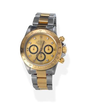 900-ROLEX OYSTER PERPETUAL DAYTONA" CRONÓGRAFO. REF:16523. CAJA Y BRAZALETE EN ACERO Y ORO AMARILLO DE 18K. Nº W246903. 