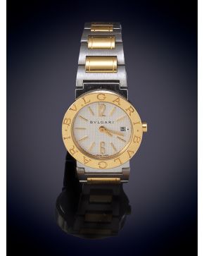 877-BVLGARI" RELOJ DE PULSERA PARA SEÑORA, CAJA Y BRAZALETE EN ACERO Y ORO. Movimiento suizo de cuar