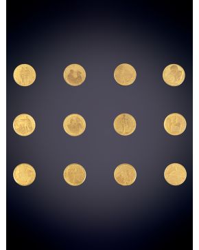 967-CONJUNTO ENMARCADO DE 12 MONEDAS CONMEMORATIVAS DE FRANCO ORO AMARILLO 900