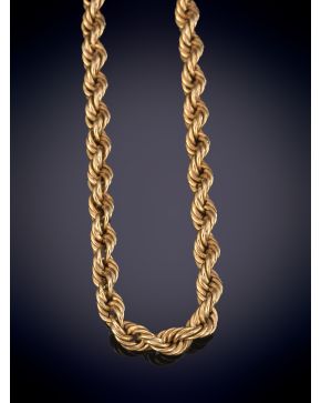 3-LOTE FORMADO POR CORDÓN RIZADO A JUEGO CON PULSERA SOBRE UNA MONTURA DE ORO AMARILLO DE 18K. 