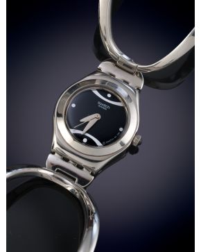 949-SWATCH. RELOJ SUIZO DE PULSERA PARA SEÑORA EN ACERO, AÑOS 60. Con estuche original.