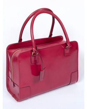 999-LOEWE" BOLSO AMAZONA EN PIEL COLOR BERENJENA. Con su funda. "