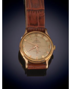 795-OMEGA CONSTELLATION AUTOMATIC CHRONOMETRE.Caja en oro amarillo de 18k. Esfera champagne con numeración a trazos y arábiga. Mov