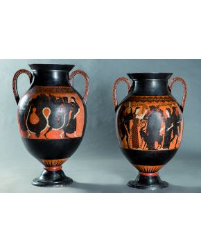 1381-Lote formado por dos ánforas griegas. estilo figuras negras. S. XIX.: Escena dionisíaca y  Mito de la Gorgona Medusa. Cerámica y engobe de color